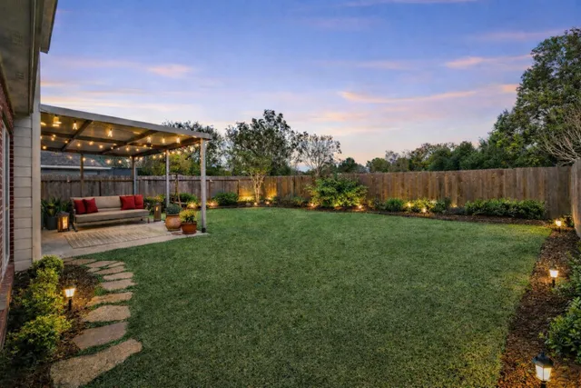 a living room with furniture a bed and a couch