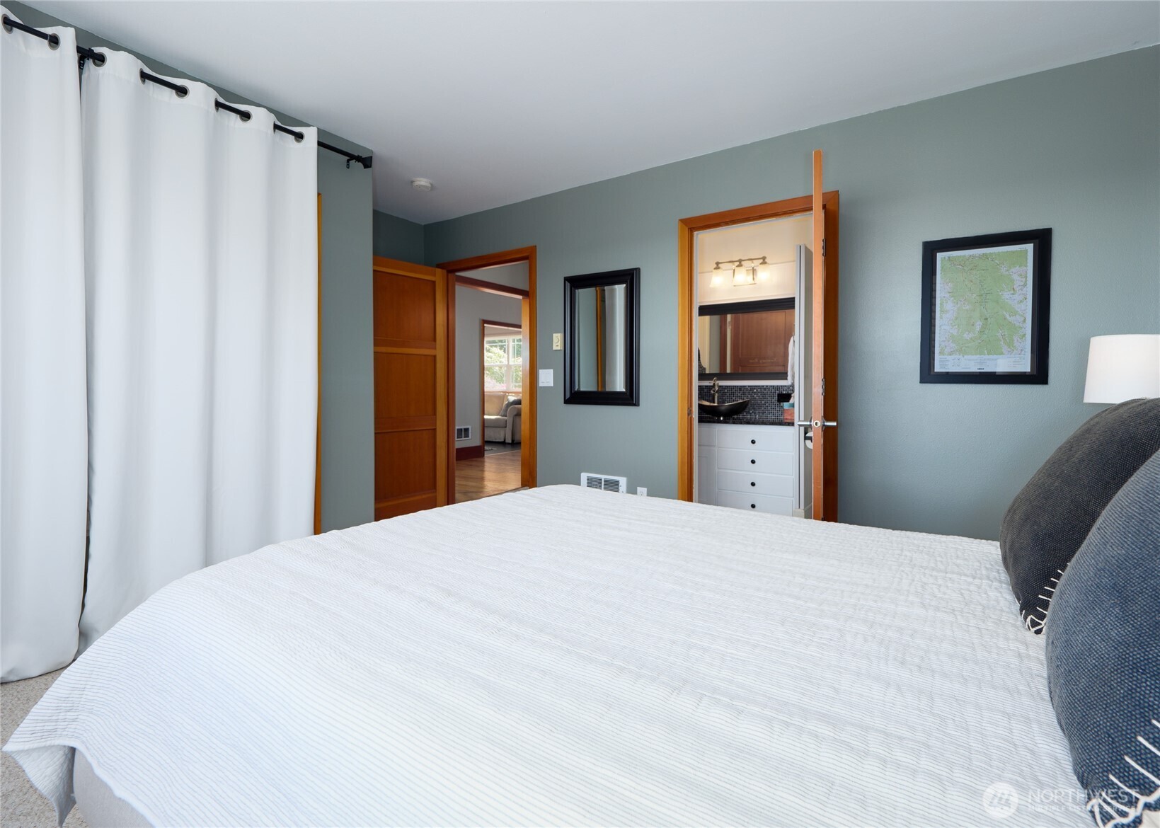 3530 West Sequim Bay Road Sequim, WA 98382 - Photo 20 of 40 a bedroom with a bed and a dresser