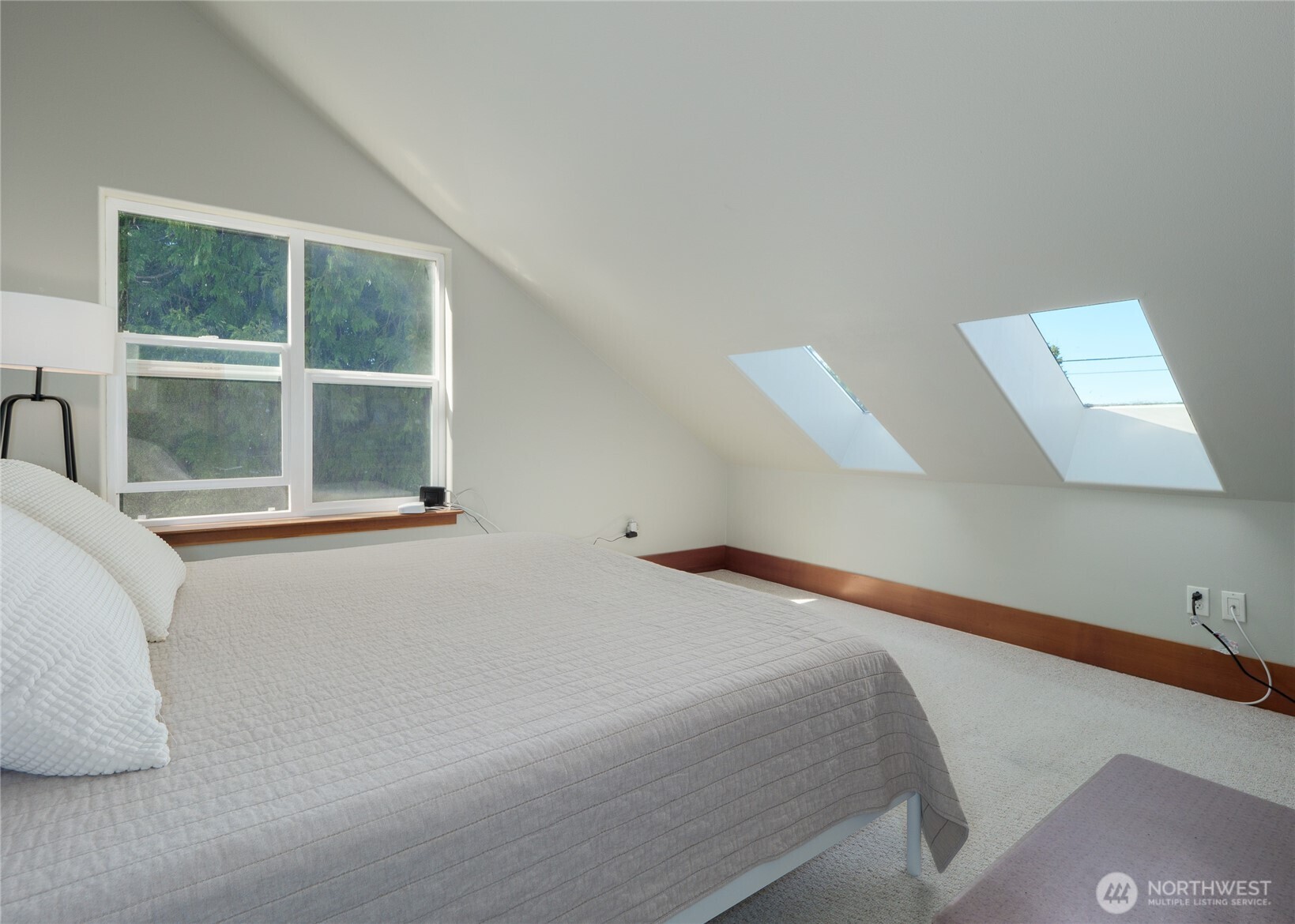 3530 West Sequim Bay Road Sequim, WA 98382 - Photo 27 of 40 a bedroom with a bed and a large window