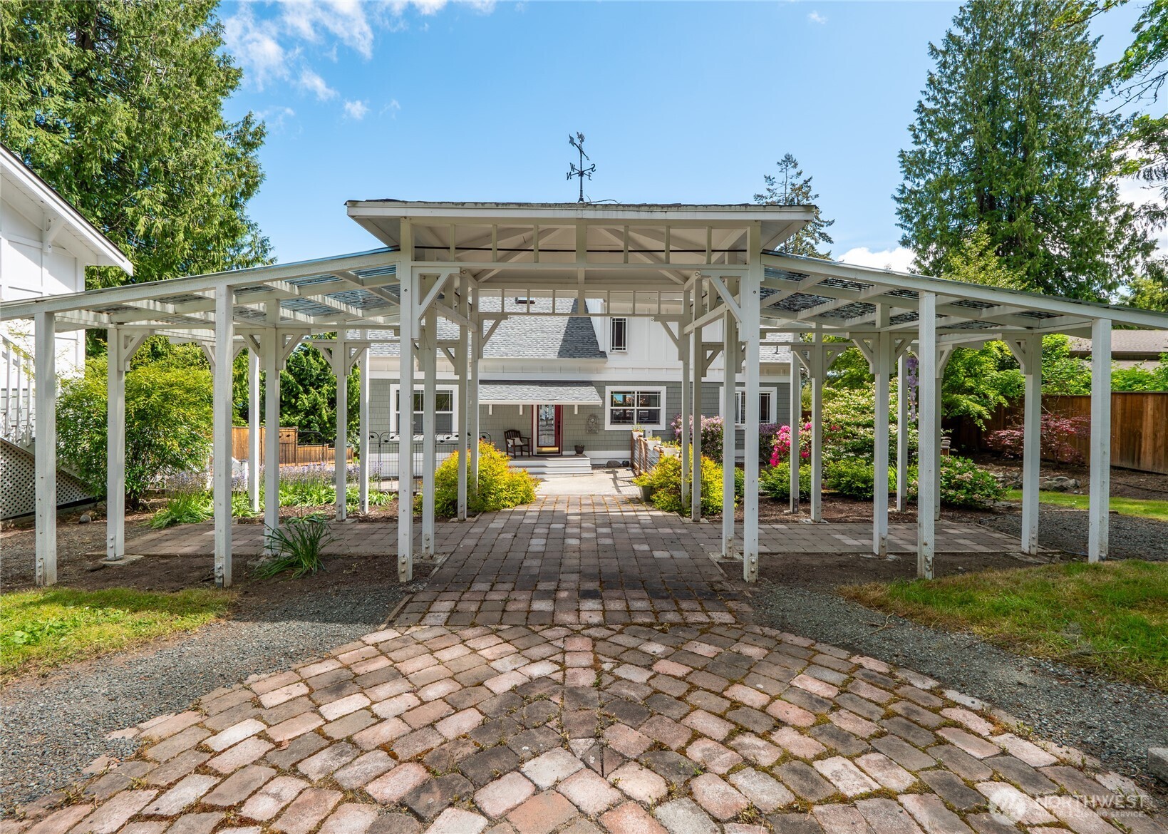 3530 West Sequim Bay Road Sequim, WA 98382 - Photo 29 of 40 a view of a house with a porch