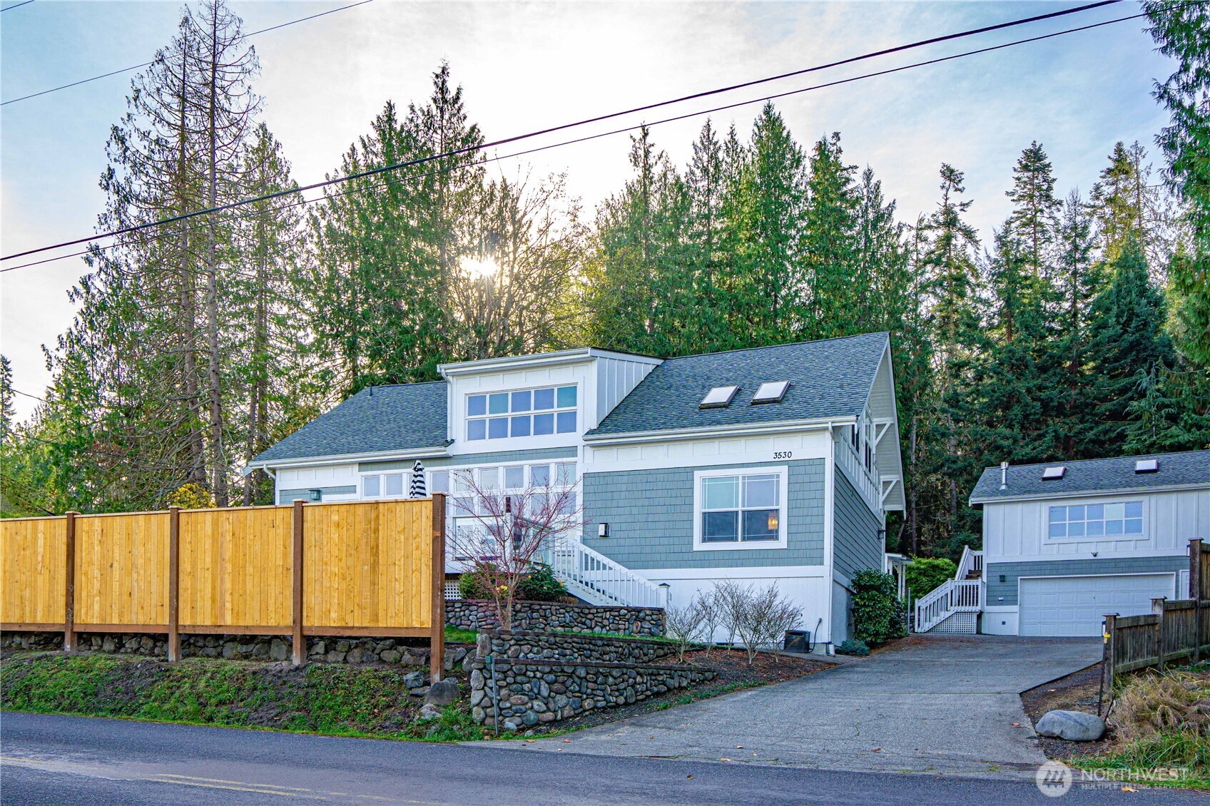 3530 West Sequim Bay Road Sequim, WA 98382 - Photo 3 of 40 a view of a house with a yard