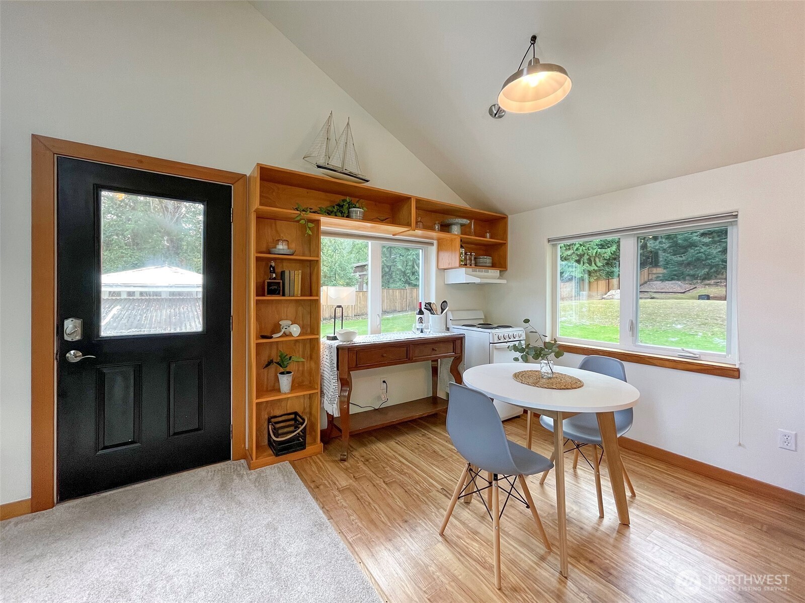 3530 West Sequim Bay Road Sequim, WA 98382 - Photo 32 of 40 a dining room with furniture and window