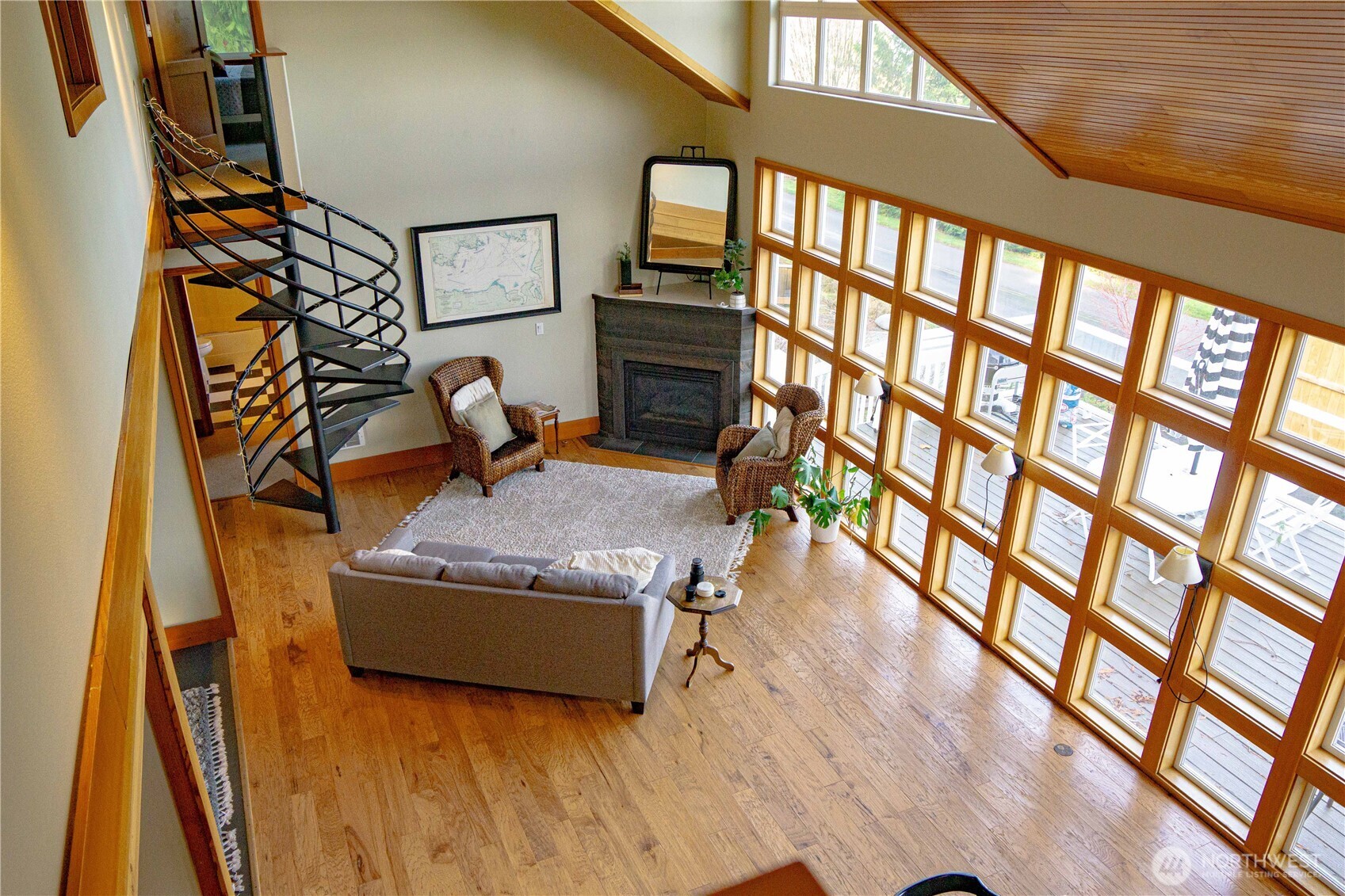 3530 West Sequim Bay Road Sequim, WA 98382 - Photo 10 of 40 a living room with furniture and a floor to ceiling window