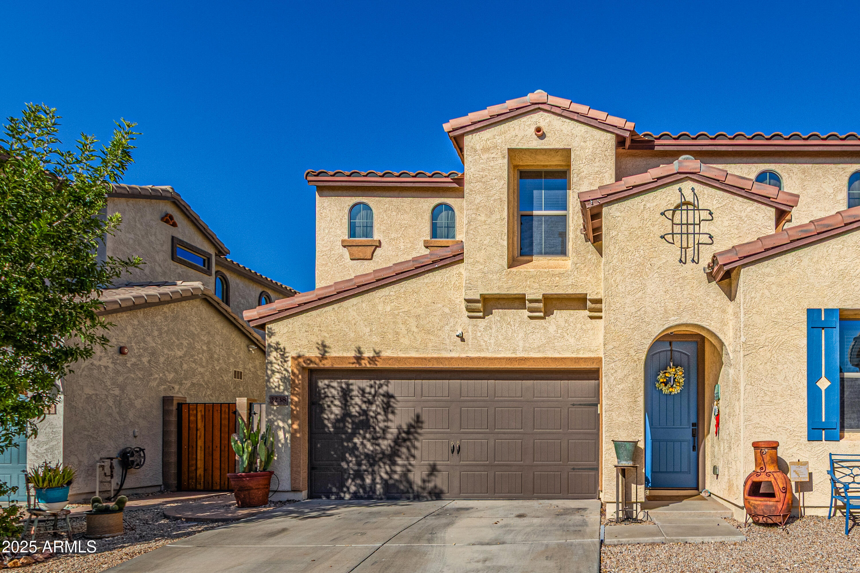 3238 East Ridgewood Lane Gilbert, AZ 85298 - Photo 2 of 43 a front view of a house with parking