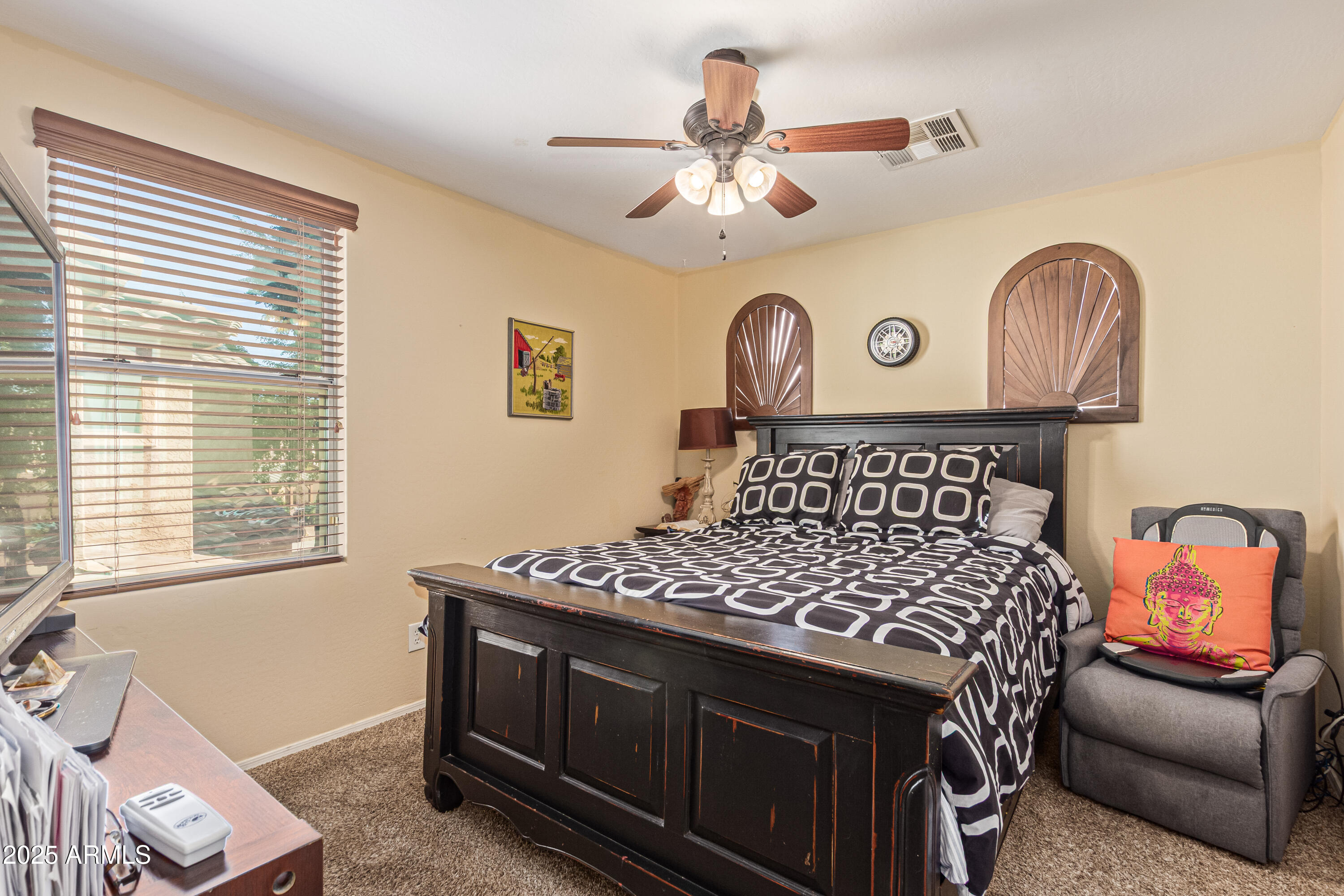 3238 East Ridgewood Lane Gilbert, AZ 85298 - Photo 22 of 43 a bedroom with a bed and a chandelier