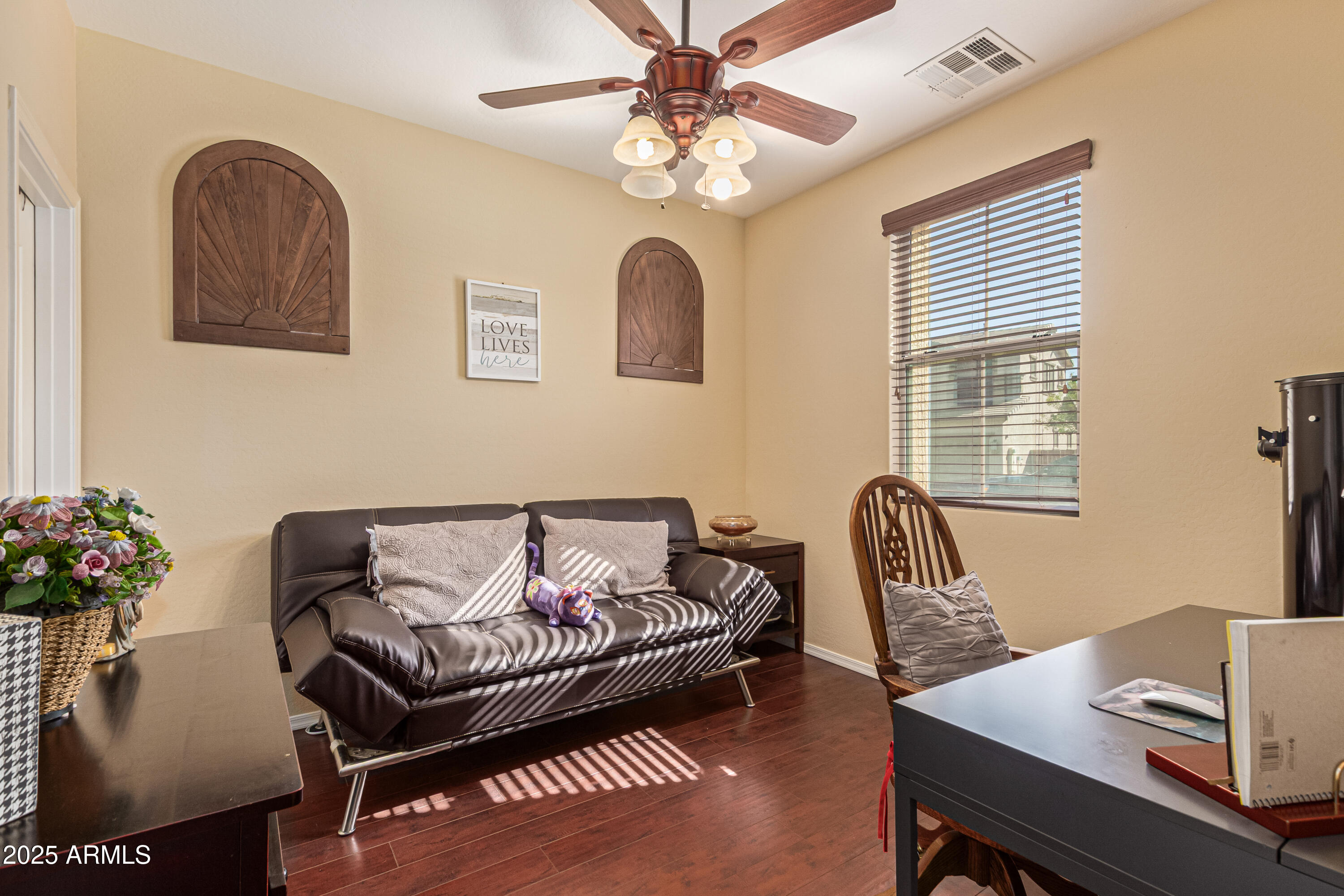 3238 East Ridgewood Lane Gilbert, AZ 85298 - Photo 24 of 43 a living room with furniture and a window