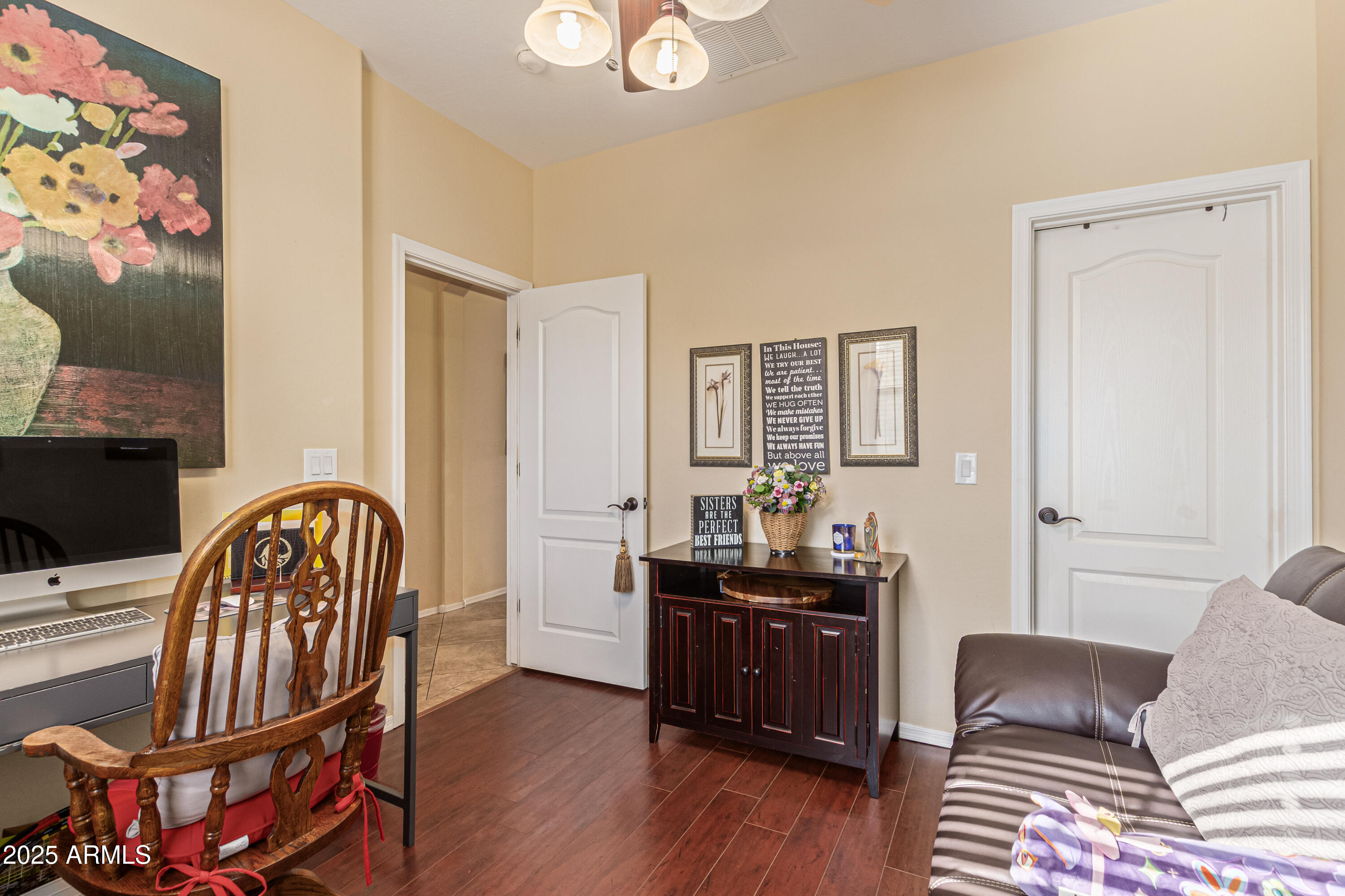 3238 East Ridgewood Lane Gilbert, AZ 85298 - Photo 25 of 43 a living room with furniture and wooden floor