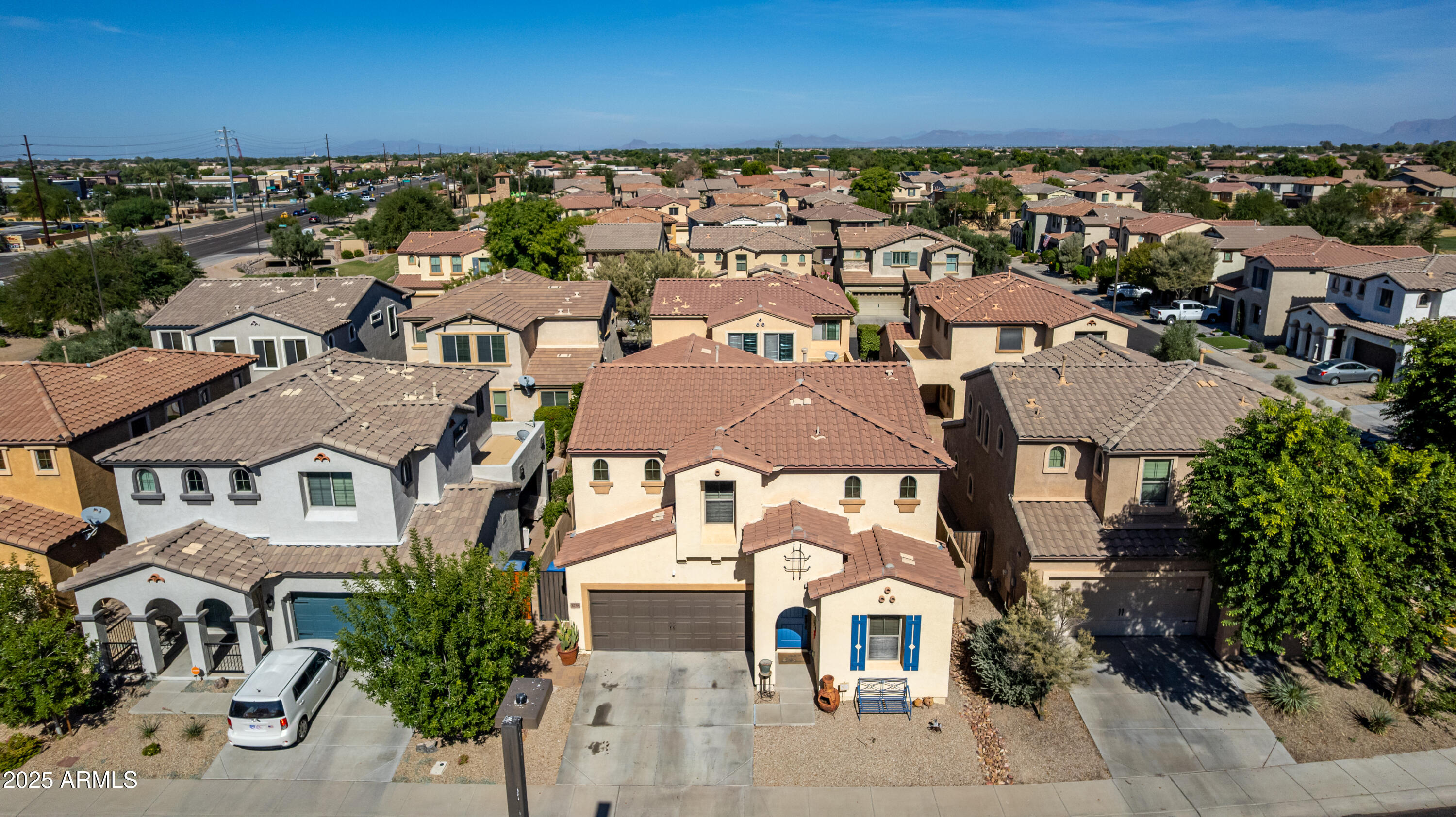3238 East Ridgewood Lane Gilbert, AZ 85298 - Photo 37 of 43 an aerial view of multiple houses with a yard