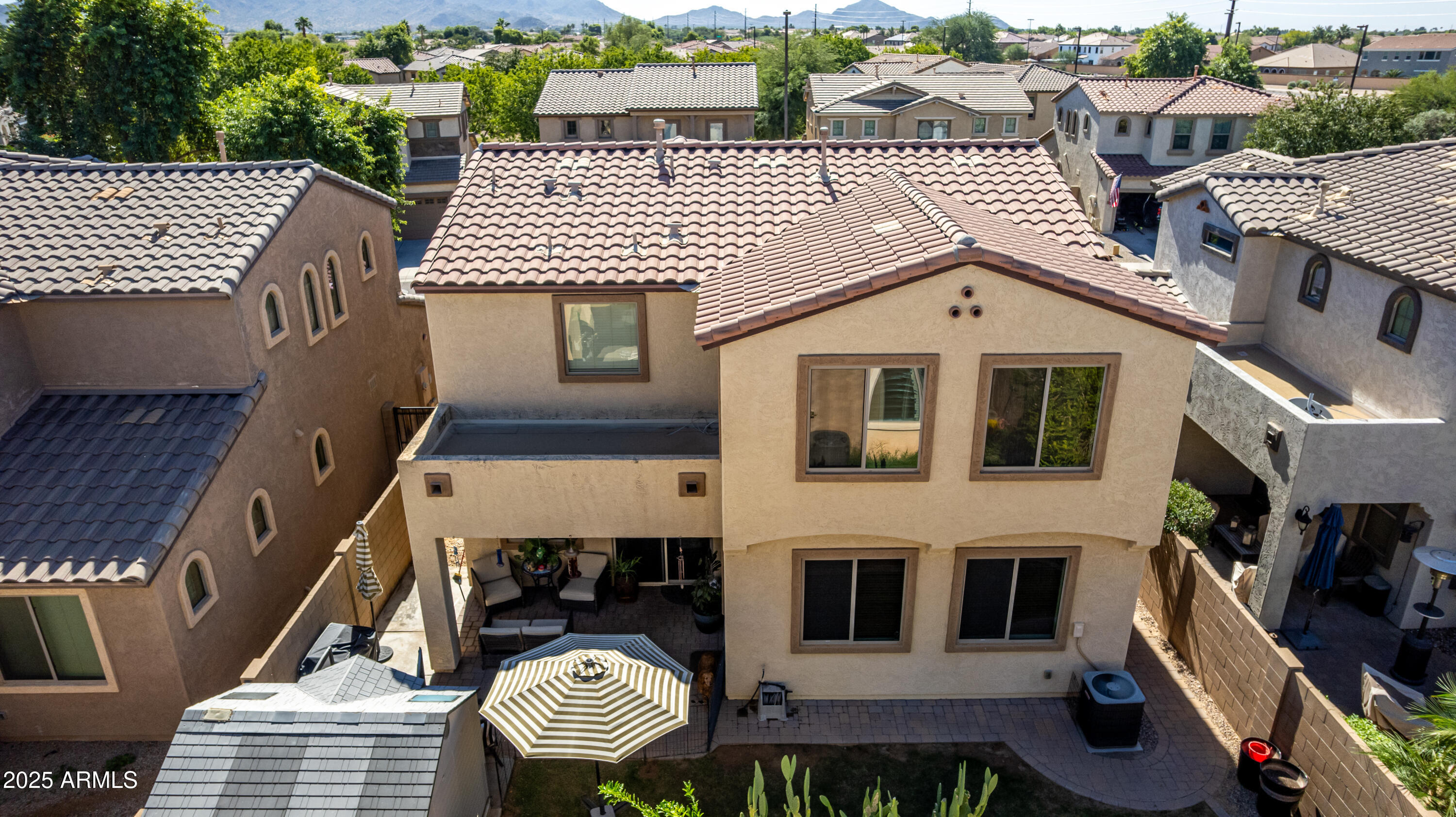 3238 East Ridgewood Lane Gilbert, AZ 85298 - Photo 40 of 43 a front view of a house with a yard