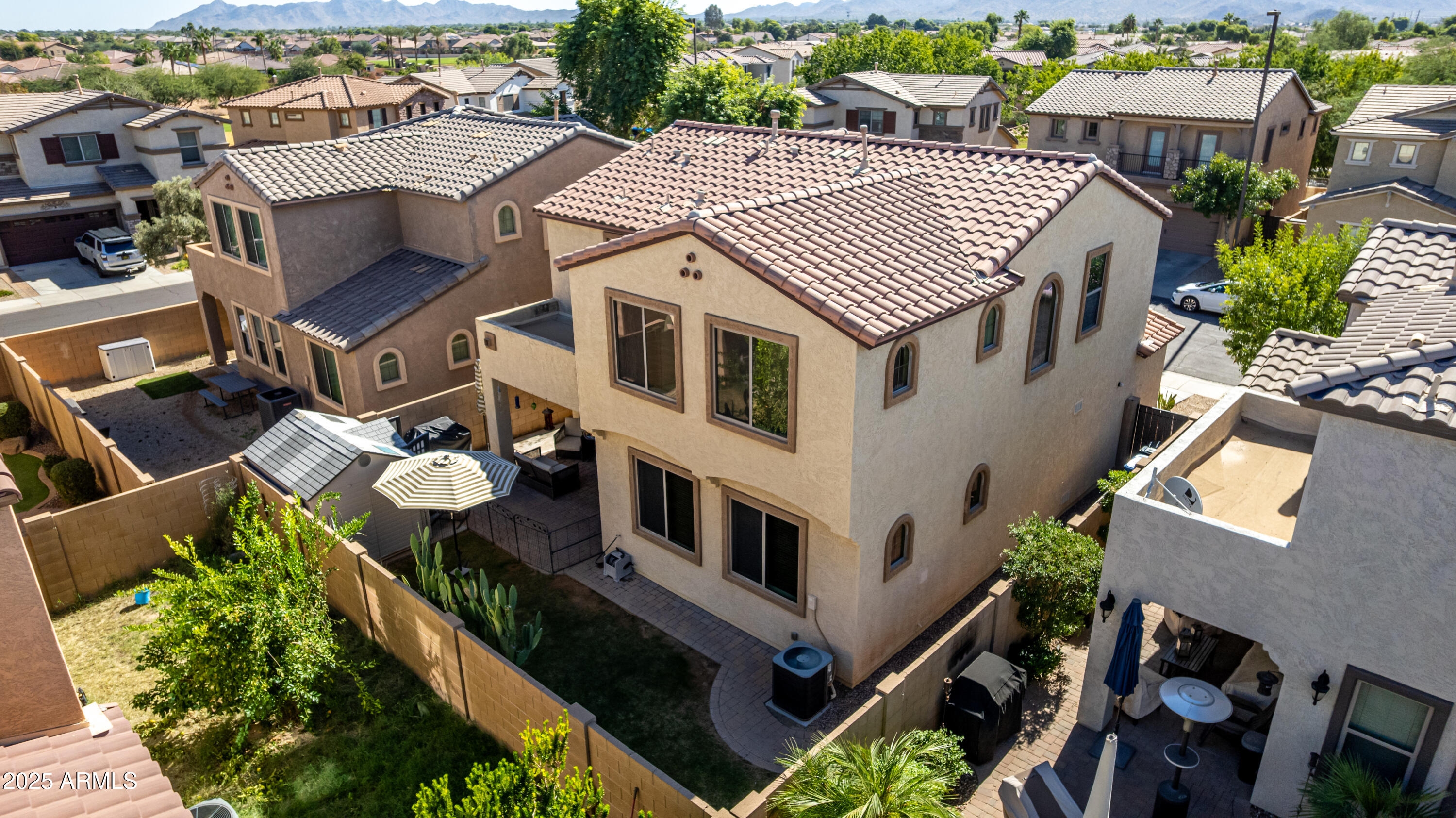 3238 East Ridgewood Lane Gilbert, AZ 85298 - Photo 41 of 43 an aerial view of multiple houses with a yard