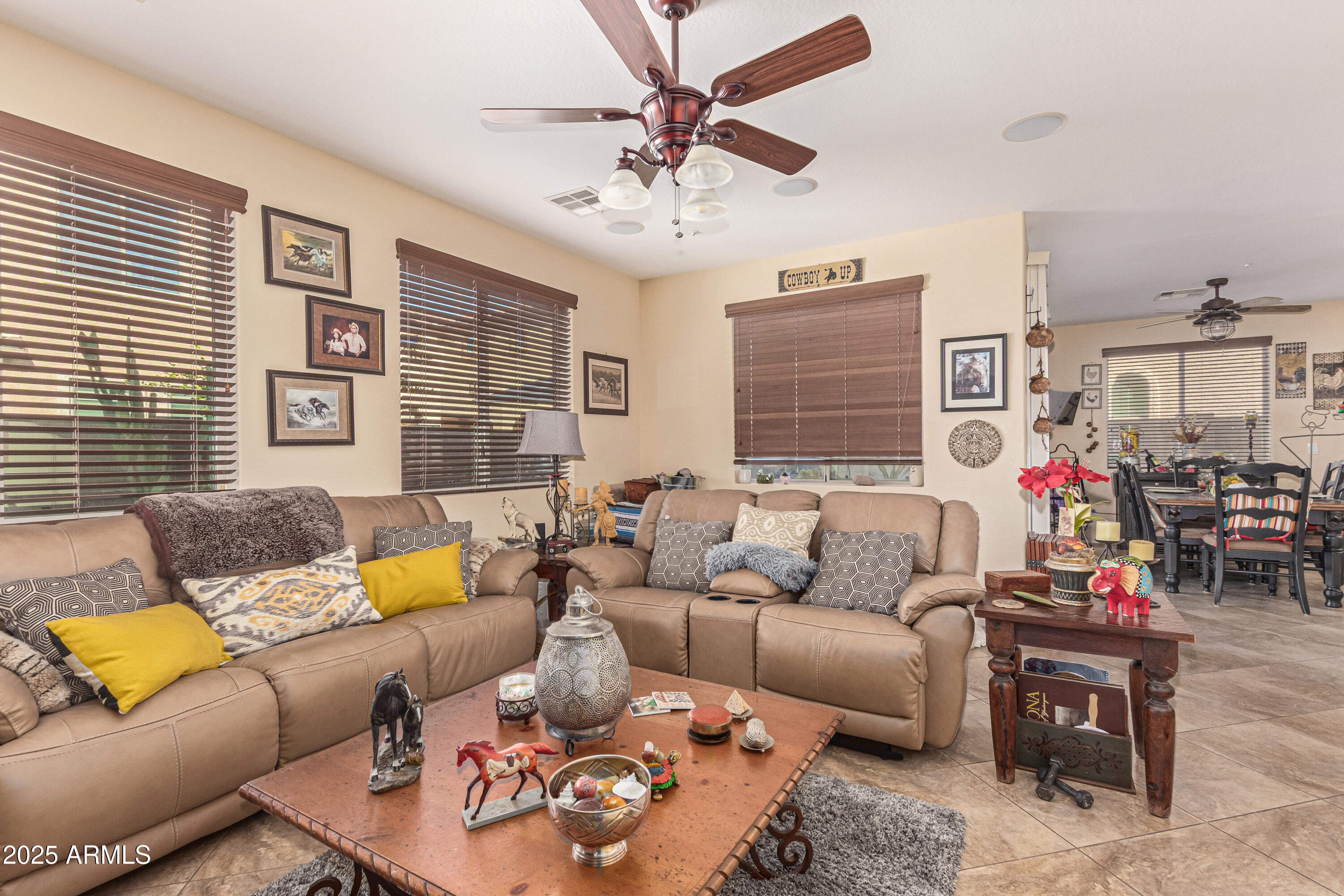 3238 East Ridgewood Lane Gilbert, AZ 85298 - Photo 7 of 43 a living room with furniture and a large window