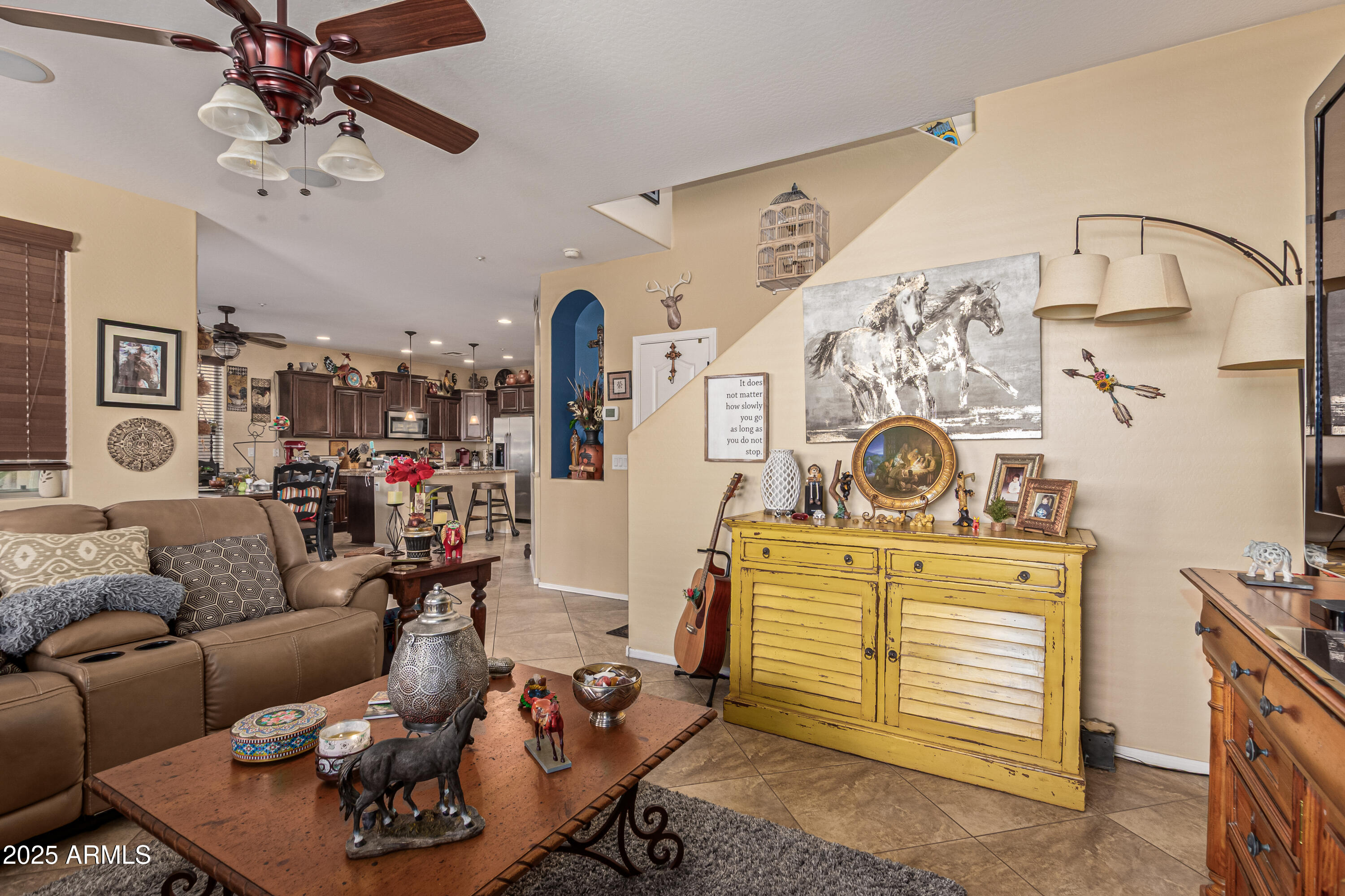 3238 East Ridgewood Lane Gilbert, AZ 85298 - Photo 8 of 43 a living room with furniture and a flat screen tv