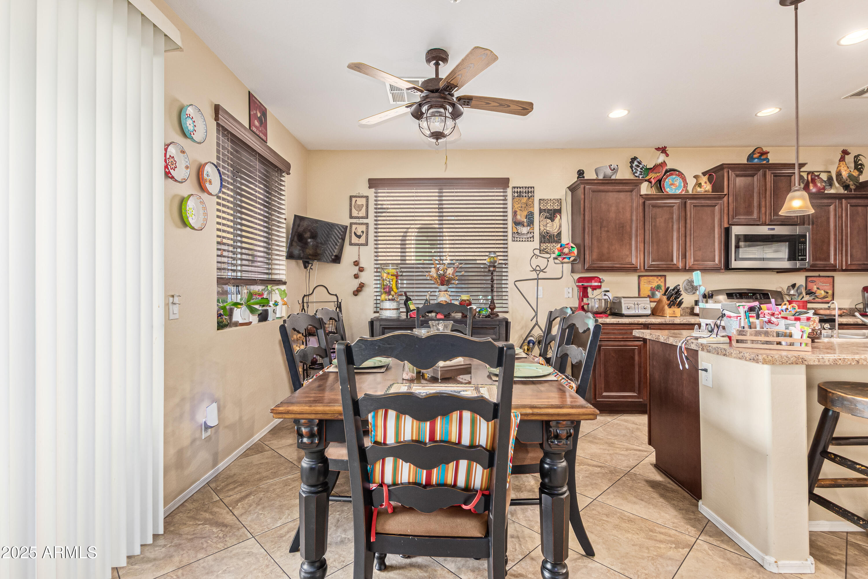3238 East Ridgewood Lane Gilbert, AZ 85298 - Photo 9 of 43 a view of a dining room with furniture window and outside view