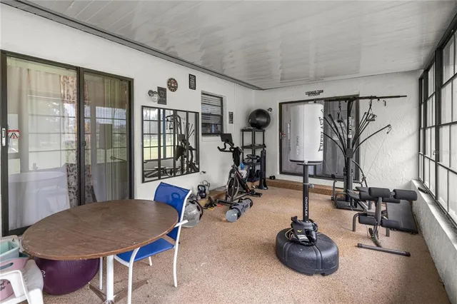 a room with furniture and window