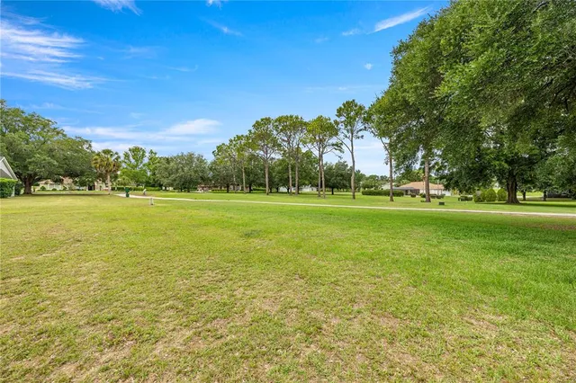 a building with trees in the background