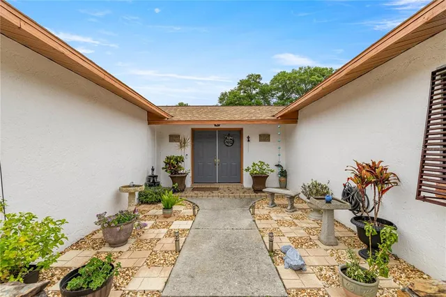 a view of house with patio