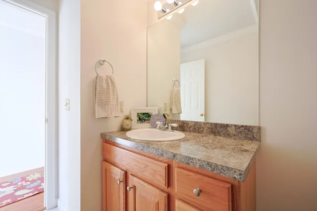 a bedroom with a bed and a tv