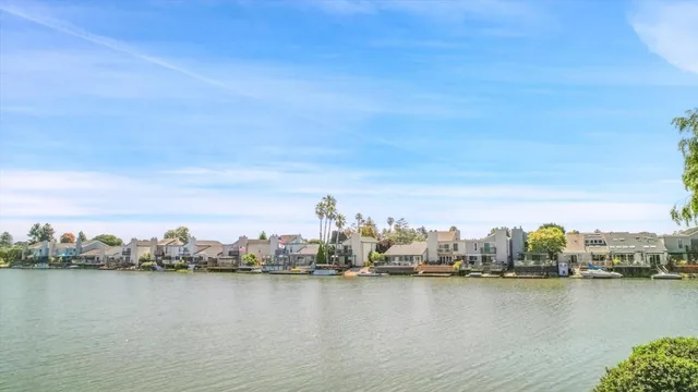 a living room with furniture a rug and a fireplace