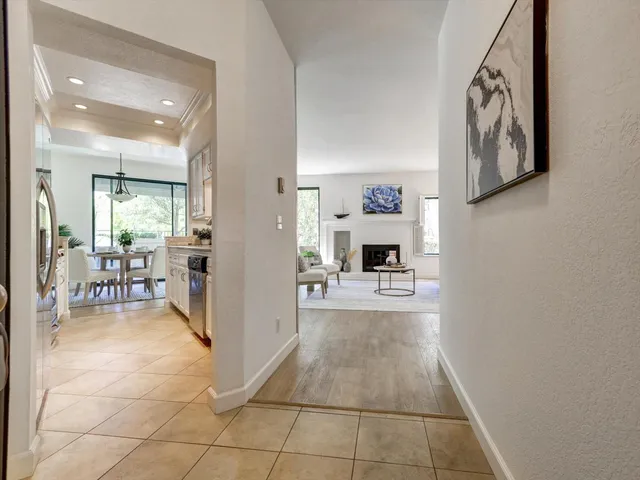 a kitchen with stainless steel appliances granite countertop a stove a microwave and cabinets