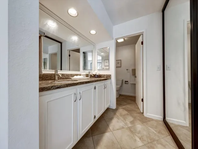 a view of a kitchen with furniture and fireplace