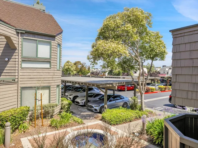 a view of a swimming pool with a lounge chairs