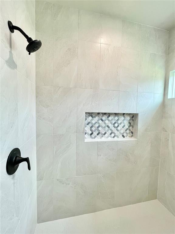1021 Southwest 67th Street Gainesville, FL 32607 - Photo 17 of 53 a bathroom with a shower