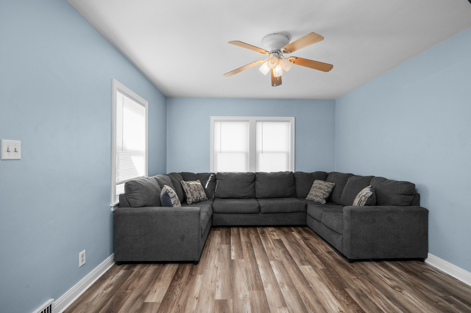 1619 20th Avenue Rock Island, IL 61201 - Photo 2 of 24 a living room with furniture and a couch