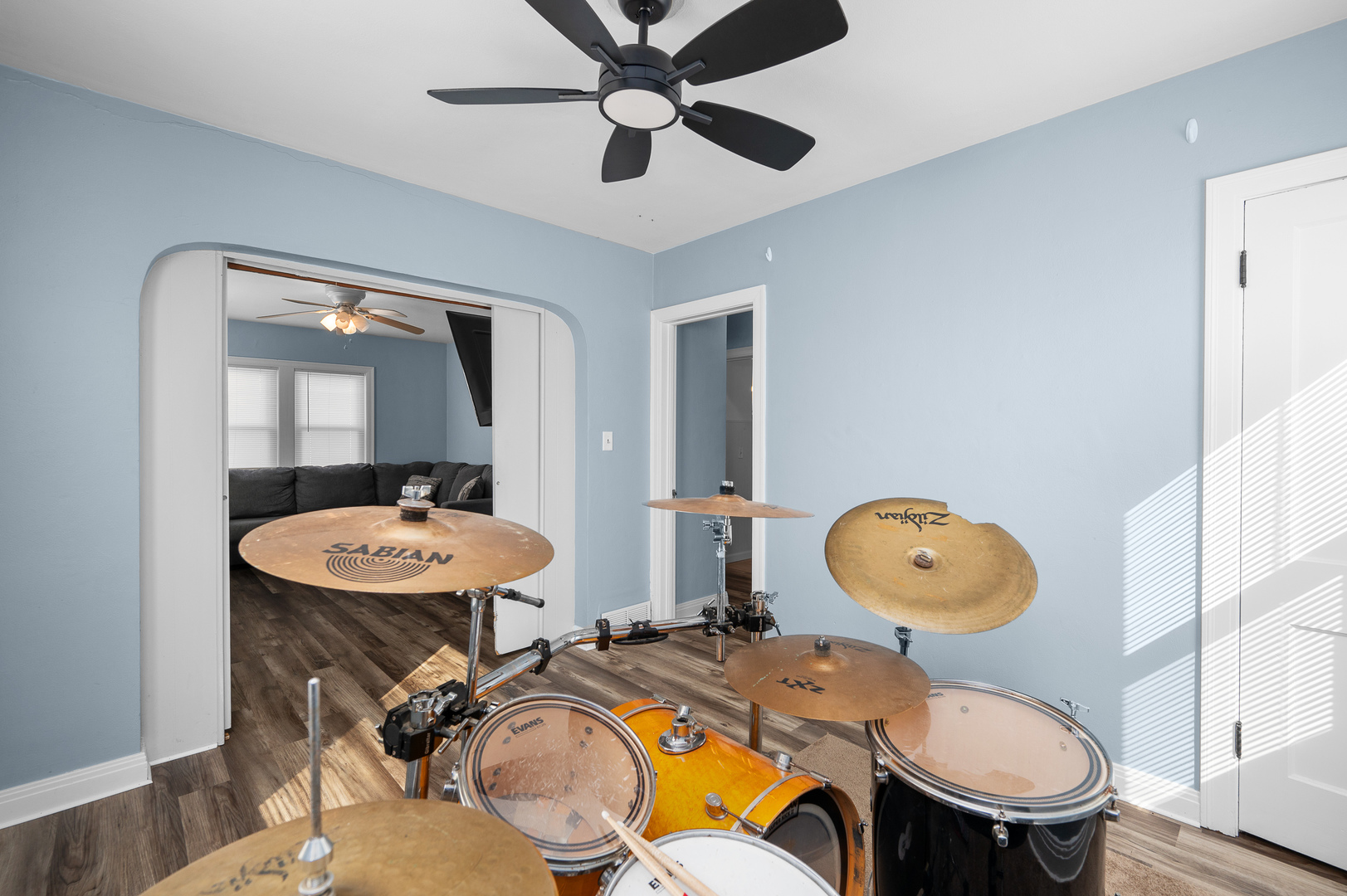1619 20th Avenue Rock Island, IL 61201 - Photo 7 of 24 a bathroom with a sink mirror toilet and a wooden floor