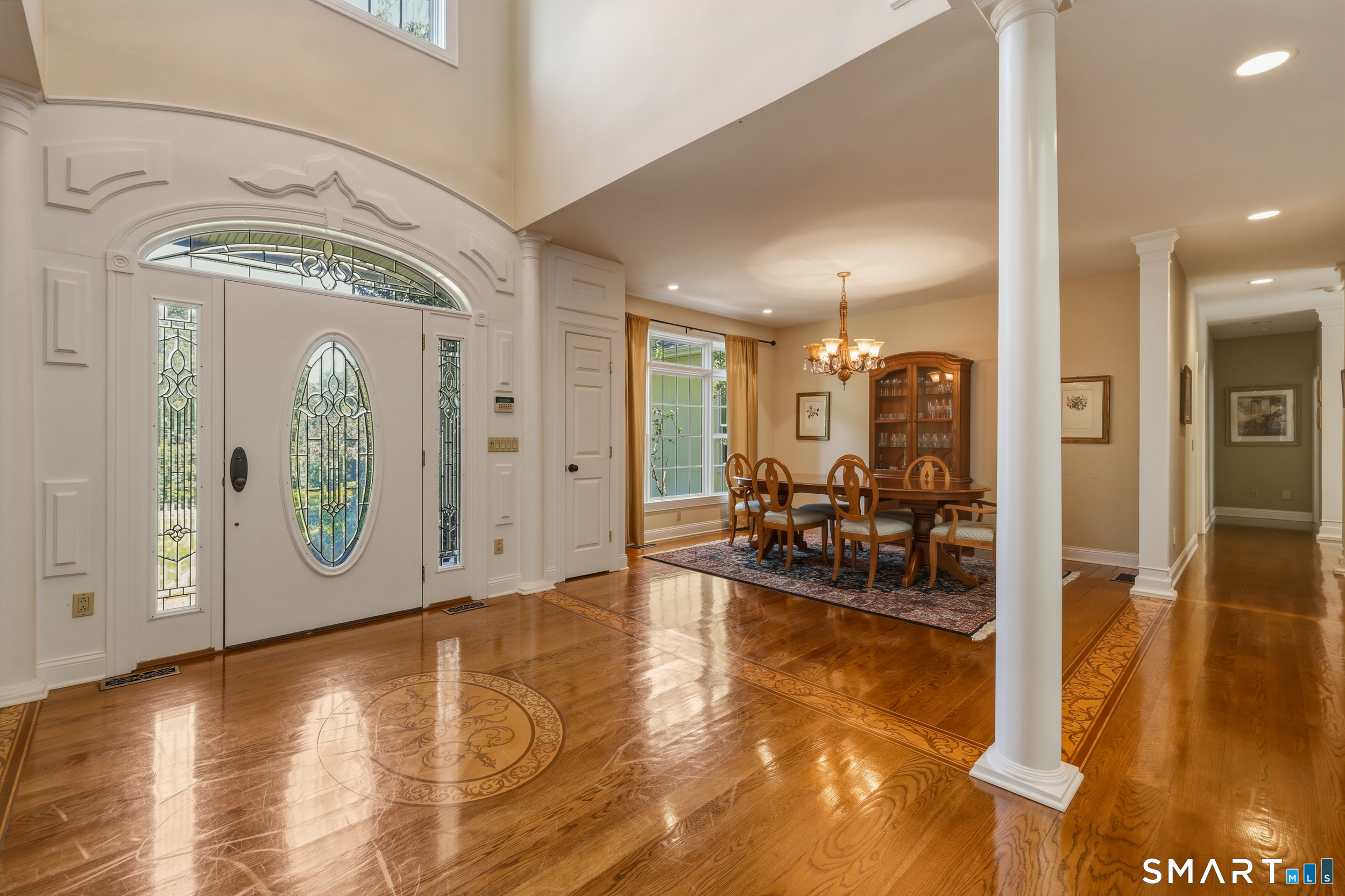 122 Lower Road Guilford, CT 06437 - Photo 5 of 40 The front foyer offers two convenient coat closets and an open flow into the formal dining and living rooms.