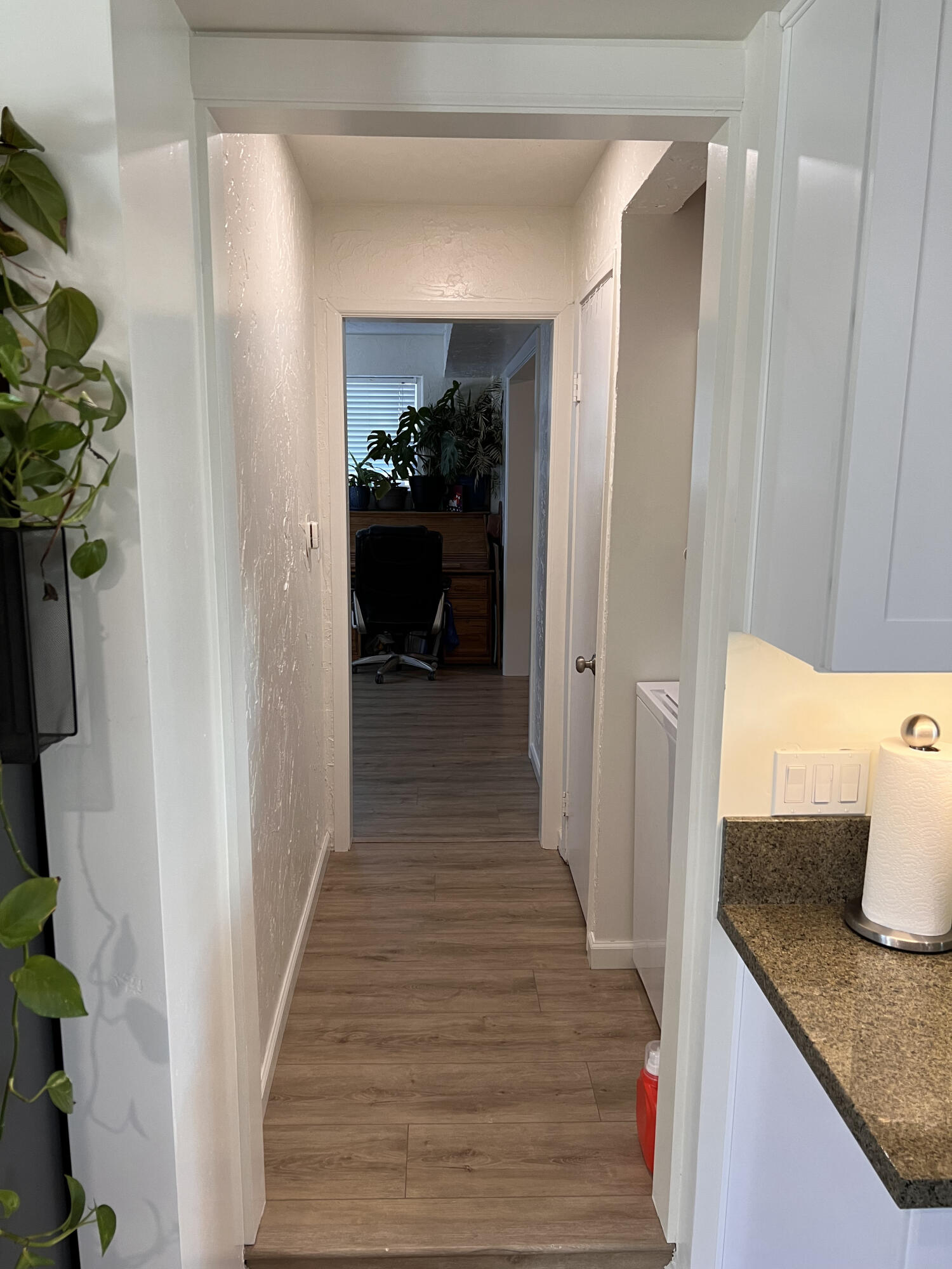 545 Sunbeam Road, Unit C Lompoc, CA 93436 - Photo 6 of 17 a view of a hallway with wooden floor and staircase