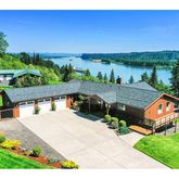 a view of a couches and lounge chairs in the patio