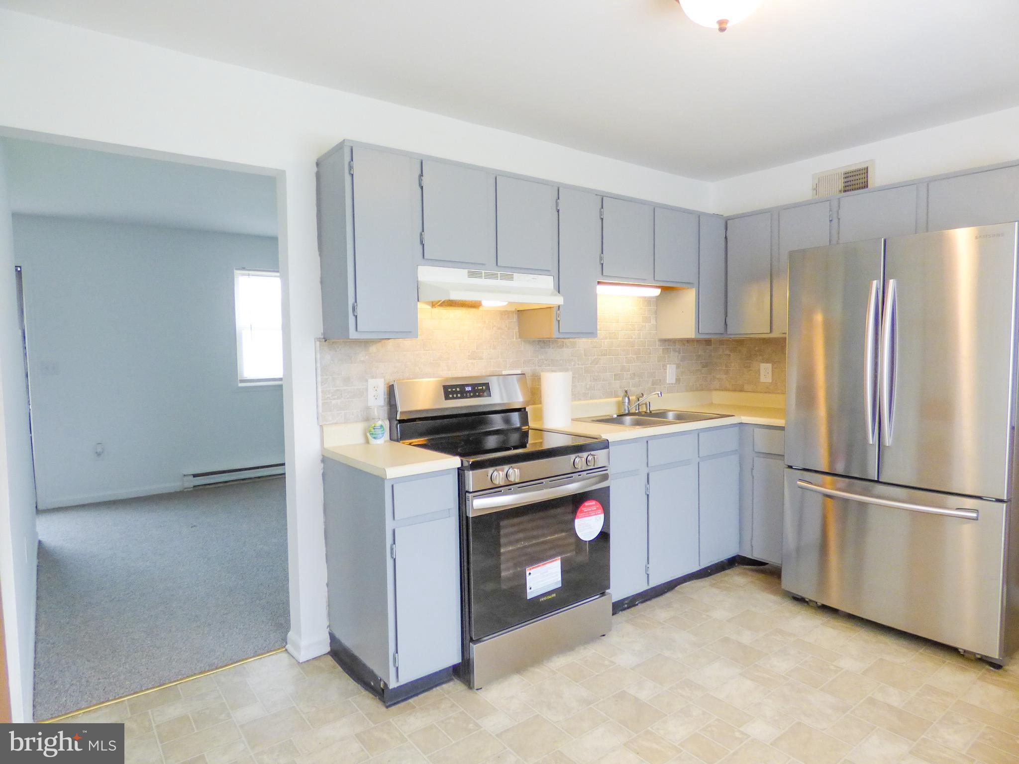 2791 Pineview Drive York, PA 17408 - Photo 11 of 23 a kitchen with a stove sink and refrigerator