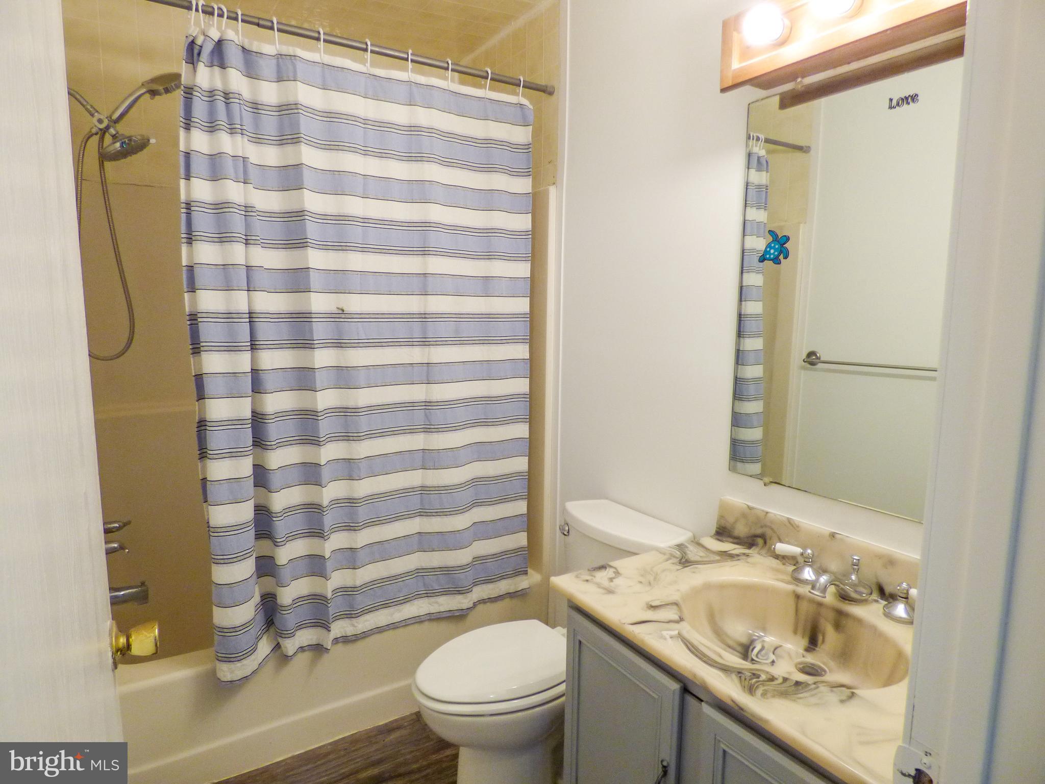 2791 Pineview Drive York, PA 17408 - Photo 12 of 23 a bathroom with a granite countertop sink toilet and shower