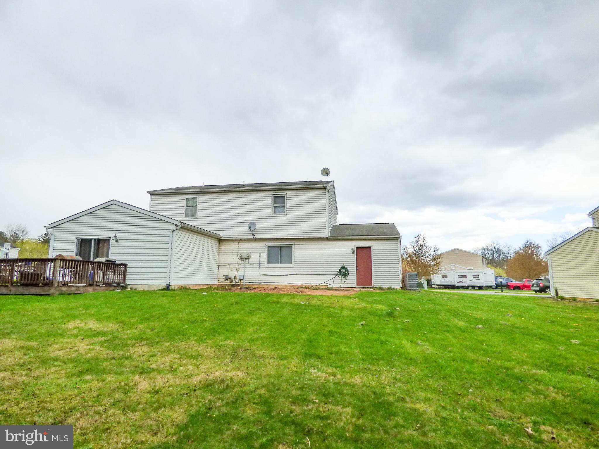 2791 Pineview Drive York, PA 17408 - Photo 3 of 23 a view of a house with a yard and sitting area