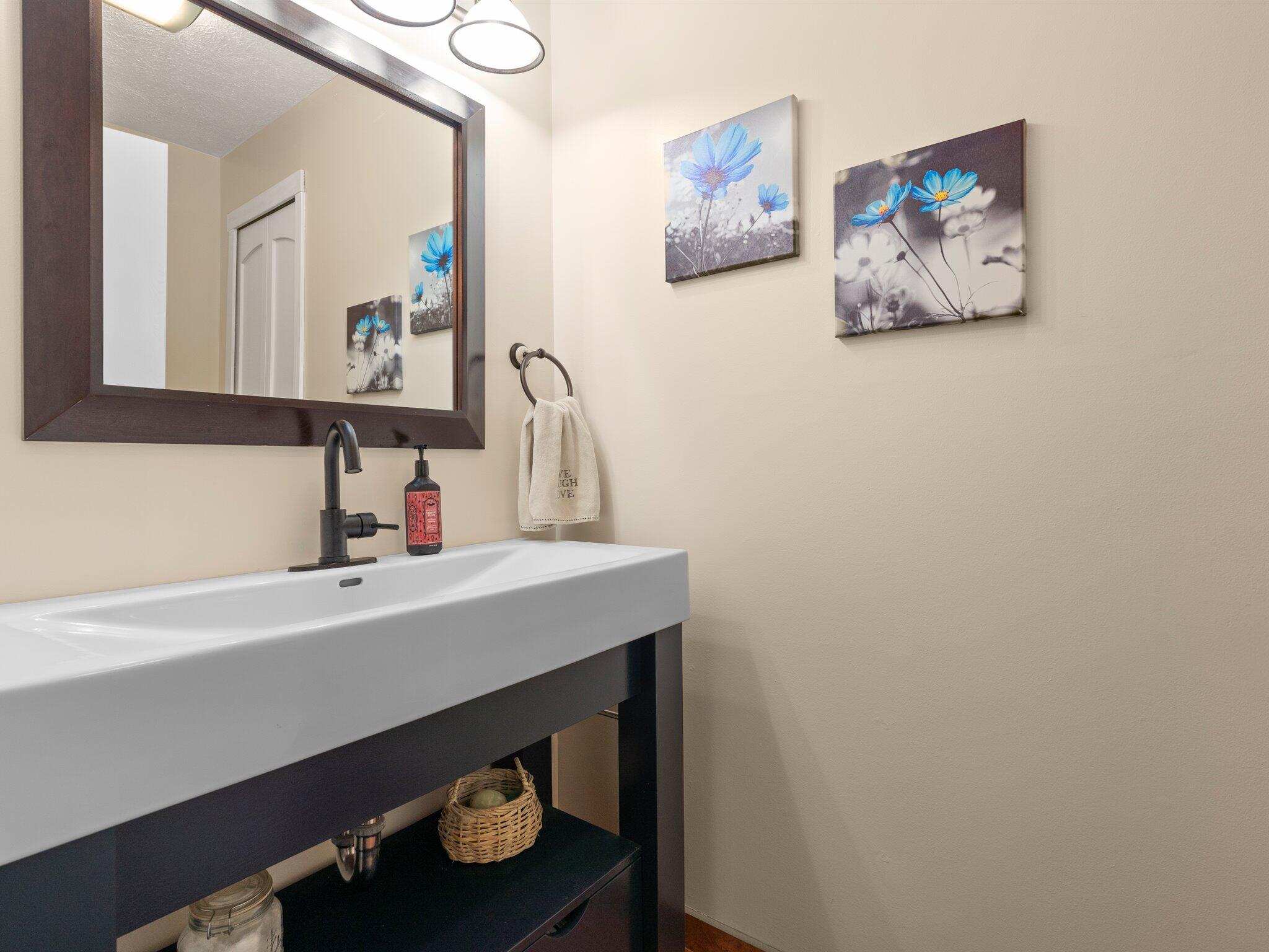 893 Pearson Road Chesterton, IN 46304 - Photo 15 of 30 a bathroom with a sink and a mirror