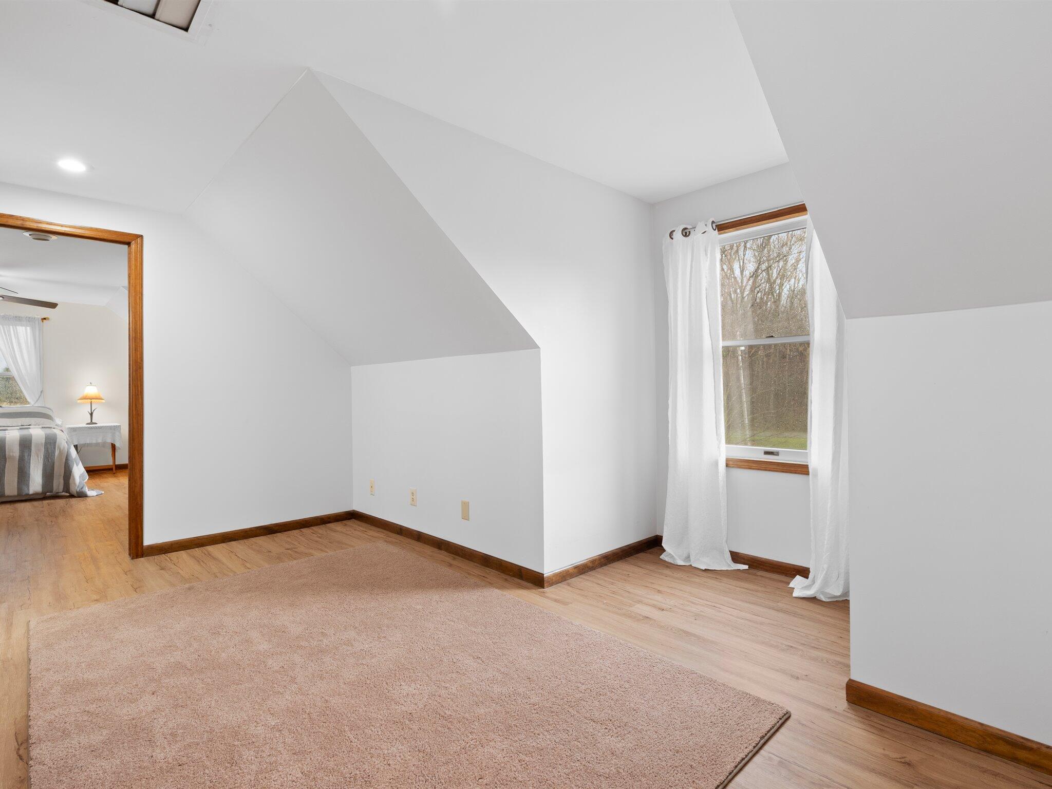 893 Pearson Road Chesterton, IN 46304 - Photo 19 of 30 an empty room with wooden floor and windows