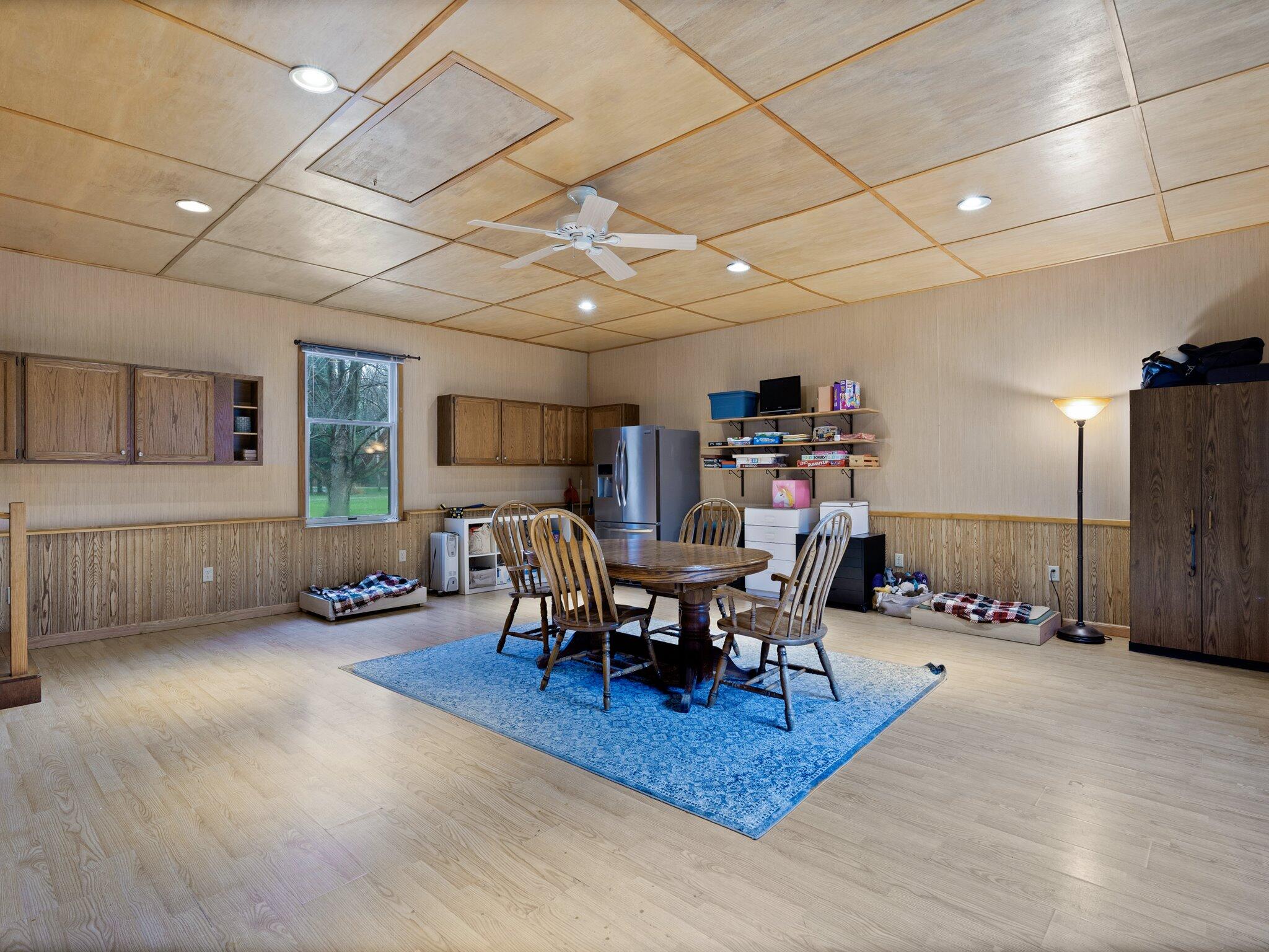 893 Pearson Road Chesterton, IN 46304 - Photo 23 of 30 a living room with furniture a wooden floor and a table