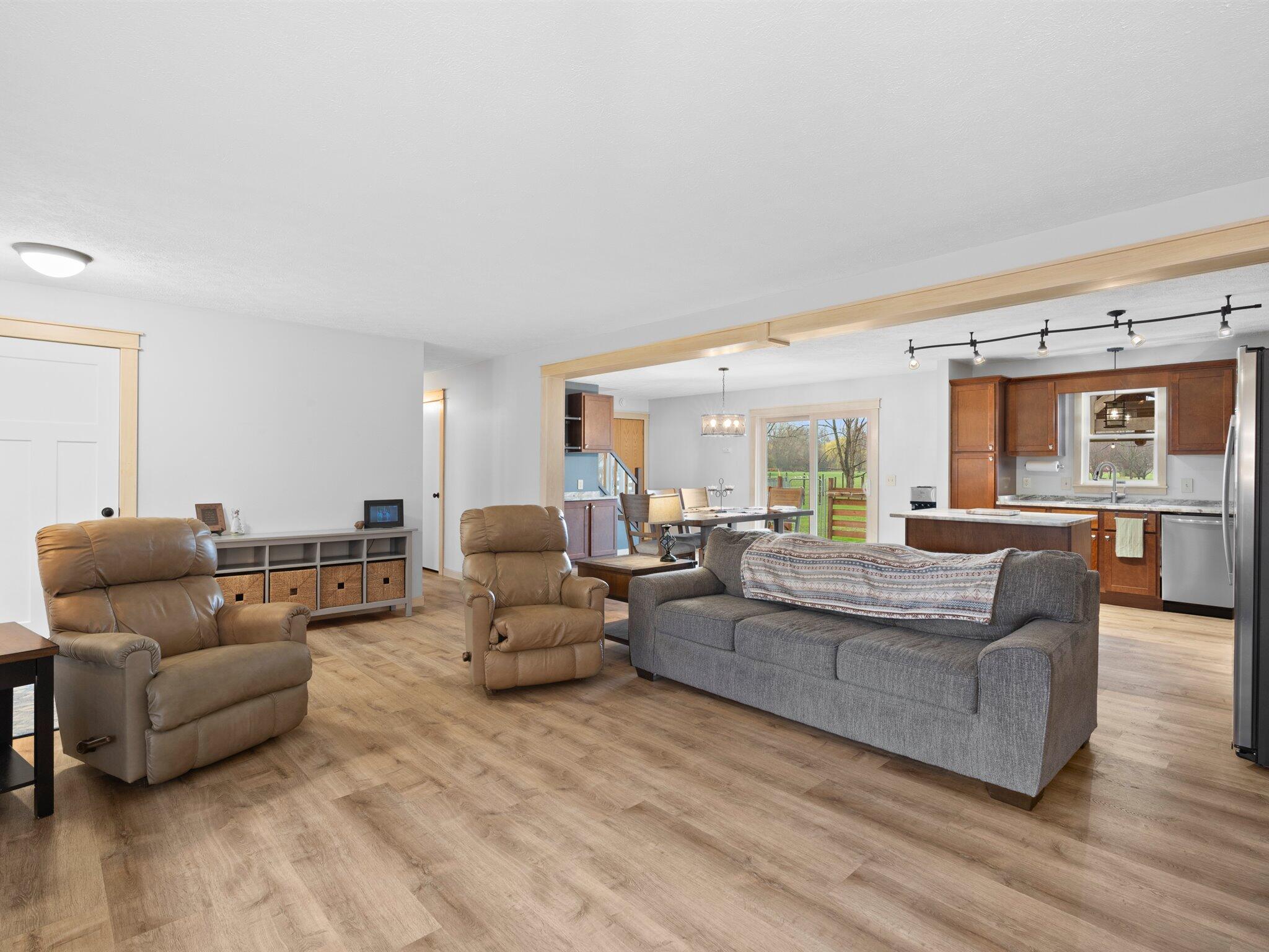 893 Pearson Road Chesterton, IN 46304 - Photo 5 of 30 a living room with fireplace furniture and wooden floor