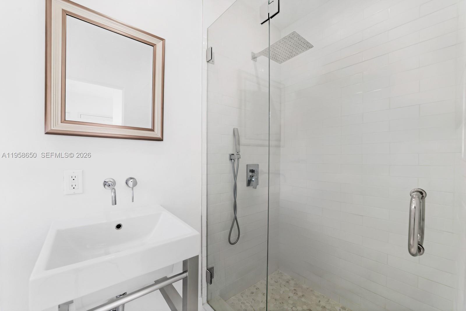 3909 Garden Avenue, Unit 4 Miami Beach, FL 33140 - Photo 11 of 29 a bathroom with a shower