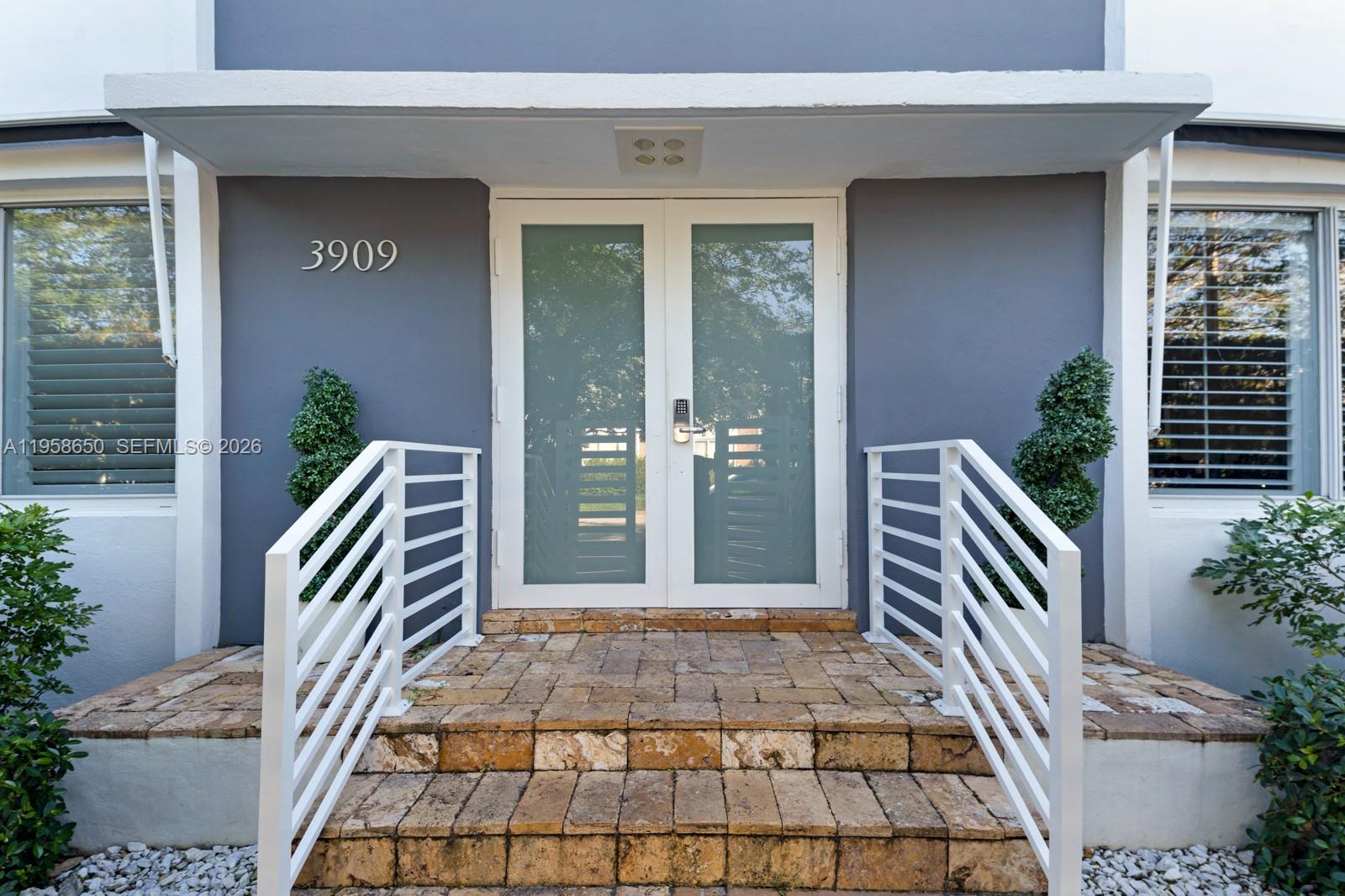3909 Garden Avenue, Unit 4 Miami Beach, FL 33140 - Photo 23 of 29 a balcony view with a outdoor space