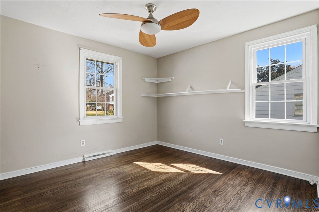 8421 Yolanda Road Henrico, VA 23229 - Photo 15 of 34 a view of empty room with wooden floor and fan