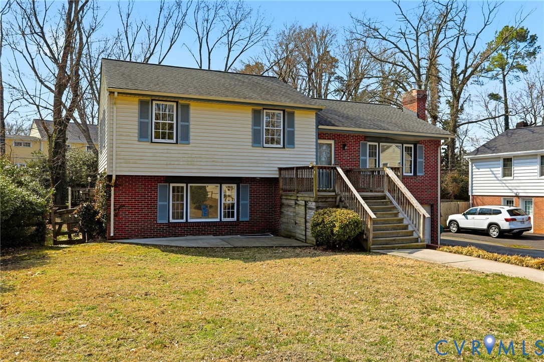 8421 Yolanda Road Henrico, VA 23229 - Photo 2 of 34 a front view of a house with a yard