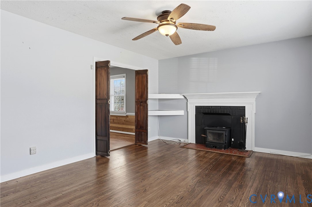 8421 Yolanda Road Henrico, VA 23229 - Photo 23 of 34 a view of empty room with wooden floor and fan
