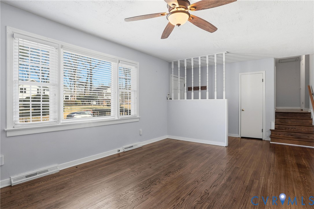 8421 Yolanda Road Henrico, VA 23229 - Photo 24 of 34 a view of an empty room with wooden floor and a window