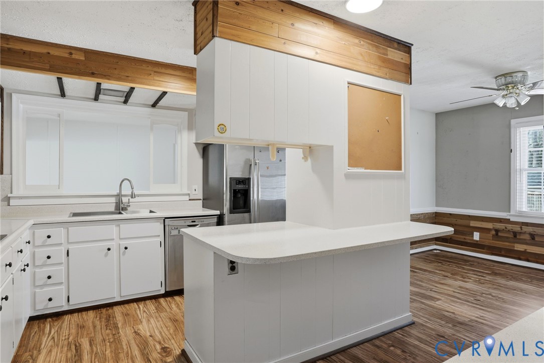8421 Yolanda Road Henrico, VA 23229 - Photo 29 of 34 a kitchen with a sink and cabinets