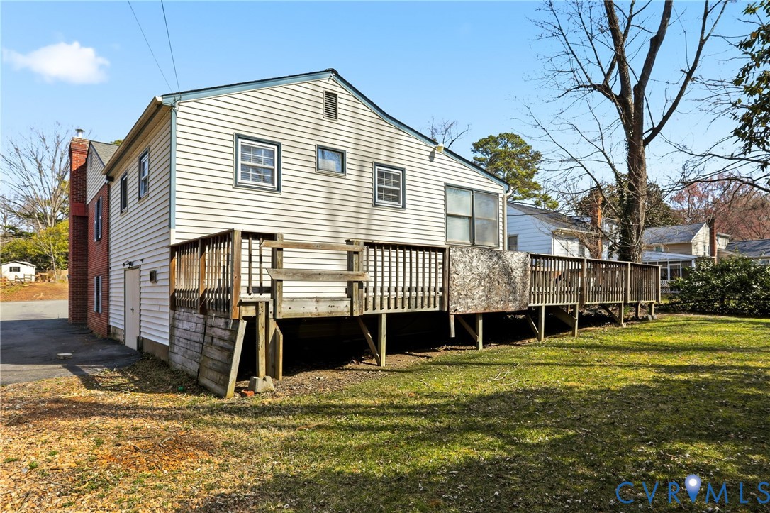 8421 Yolanda Road Henrico, VA 23229 - Photo 3 of 34 a front view of a house with a yard