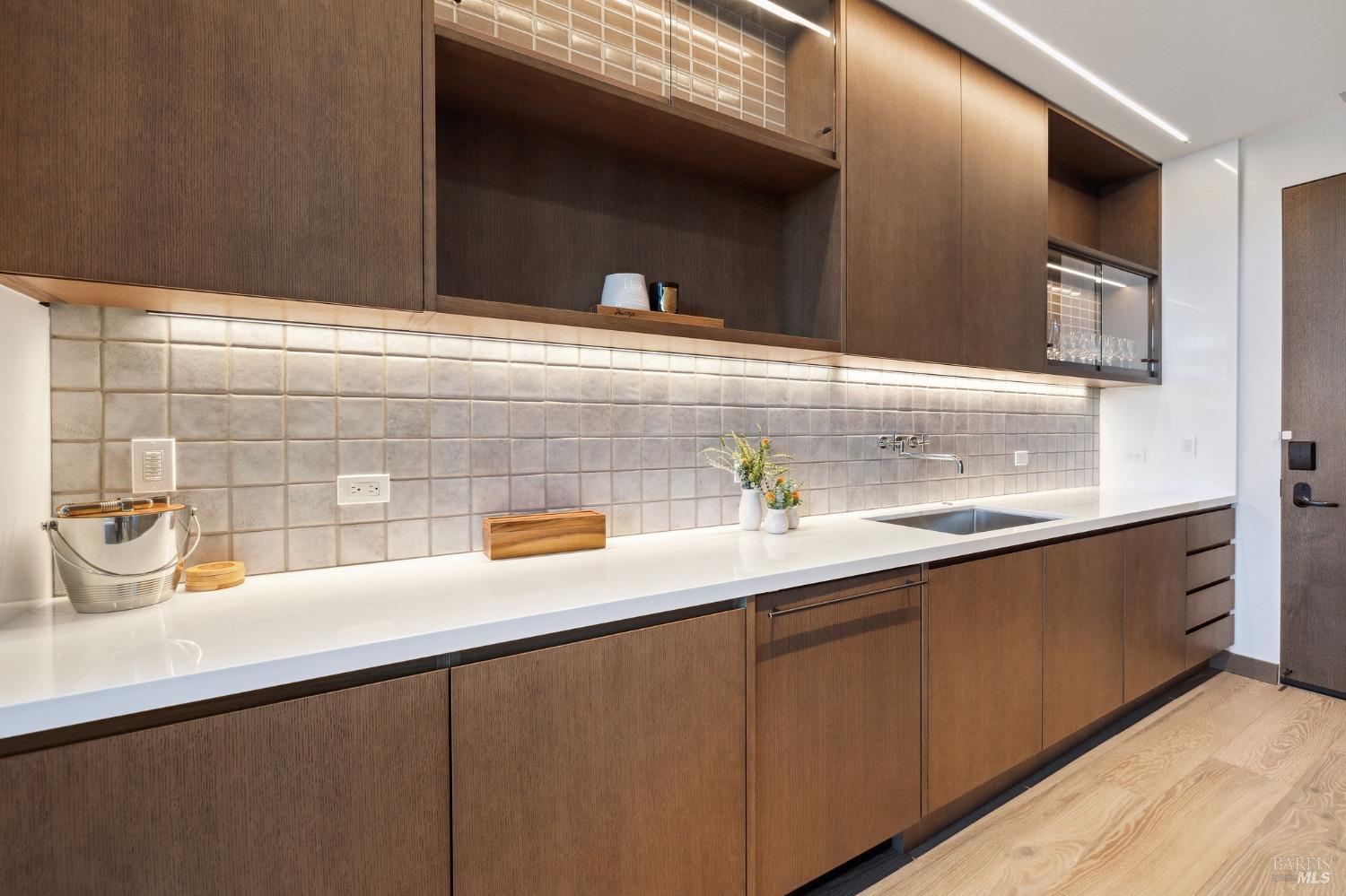 210 East Sumac Court Healdsburg, CA 95448 - Photo 17 of 32 a kitchen with a sink and cabinets