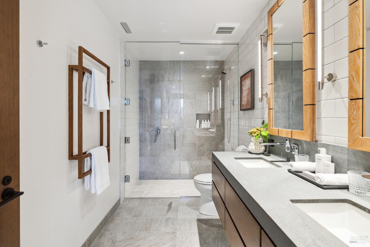 210 East Sumac Court Healdsburg, CA 95448 - Photo 22 of 32 a bathroom with a granite countertop sink a mirror a shower and a bathtub