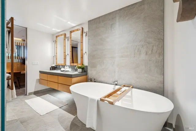 a view of a hallway with washer and dryer