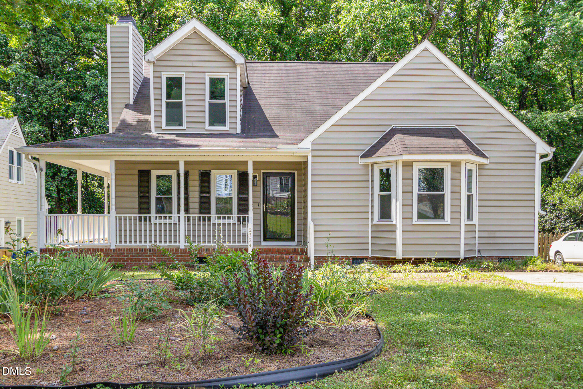 2324 Dahlgreen Road Raleigh, NC 27615 - Photo 1 of 21 a view of a house with a yard and plants